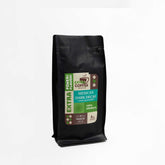 Black bag of Mexican Dark Decaf coffee, 100% Arabica, 8 oz, premium decaf with rich flavor and antioxidant benefits
